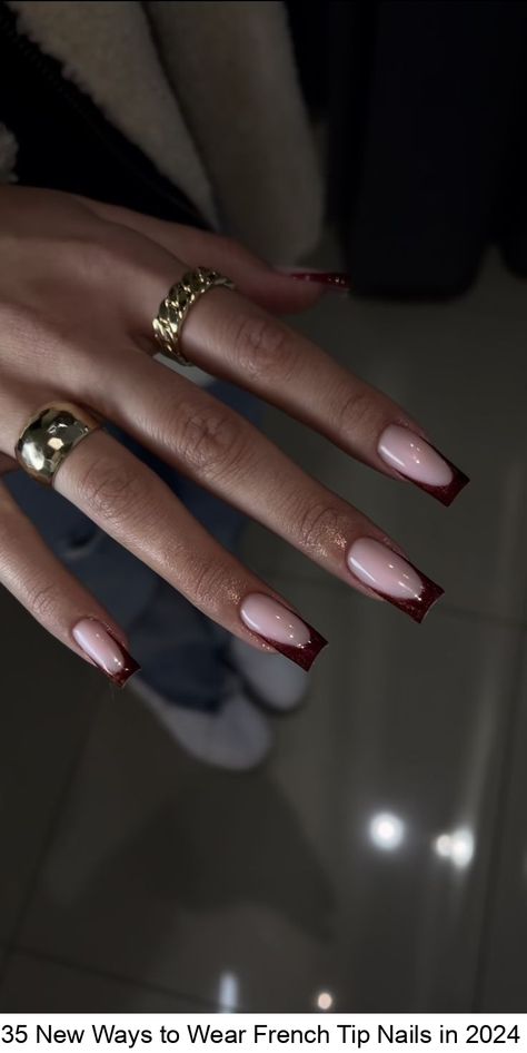 If you thought the French tip nail designs were a relic of the beauty trends of the 00s, we have news for you. The classic French manicure is making a major comeback in 2024 — but with a twist. Perhaps the most undefeated nail trend to exist is the classic French manicure (remember when square acrylic... Burgundy French Tip Nails Coffin, Wine Red French Tip Nails Square, Nails 2024 Square, Red Tip Nails Square, Elegant Nails Classy 2024 Square, Trend Nails 2024, Long Square Nails Ideas, Square Nails Inspiration, Nails Inspiration French