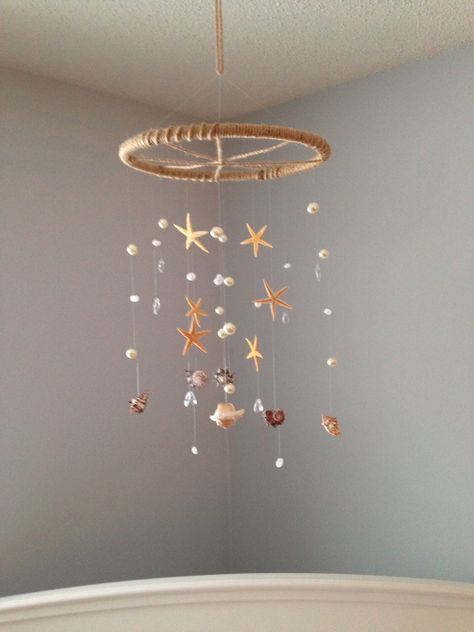 Seashell Mobile, Shell Mobile, Starfish Mobile, Pearl Mobile, Crystal Mobile, Beach Mobile, Nautical Mobile by MaviSellsSeashells on Etsy https://www.etsy.com/listing/222015100/seashell-mobile-shell-mobile-starfish Seashell Mobile, Nautical Mobile, Carillons Diy, Clay Idea, Crystal Mobile, Shell Mobile, Mermaid Nursery, Beachy Room, Diy Wind Chimes