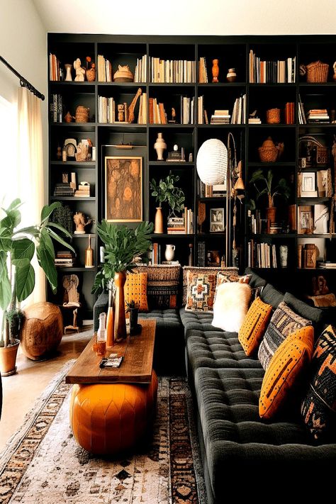 Dark wood bookshelf adding classic charm to a bohemian living room on a budget. 70s Living Room, Modern Bohemian Living Room, Moody Living Room, Bohemian Living Rooms, Decor Western, Interior Design Per La Casa, Design Apartment, Living Room On A Budget, Bohemian Living Room