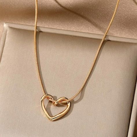 Elevate your everyday style with our stunning heart necklaces! 💖 Crafted from durable stainless steel in a timeless gold finish, these necklaces are the perfect accessory to add a touch of love and elegance to any outfit. Get Now for free shipping and low price 💥👇 https://glowonlinestore.com/products/simple-love-heart-necklace-for-women . . #heartnecklaces #stainlessteeljewelry #goldjewelry #womensnecklaces #fashionjewelry #statementnecklaces #minimalistnecklaces #delicatejewelry #trendyneckl... Jewellery Photo, Pendant Necklace Simple, Hollow Heart, Mens Jewelry Necklace, Waterproof Jewelry, Mua Sắm, Pendant Design, Heart Pendant Necklace, Jewelry Party