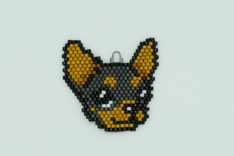 Chihuahua charm for backpack, zipper pull, or necklace, brick stitch with miyuki glass seed beads.  The item pictured is the item that will be received, items are not made to order Disclaimer: metal findings may lose their finish, over time. Recommended to keep pieces dry, and not expose them to water. Soft jewelry polishing cloths recommended for cleaning the beads and stones. Pattern by AmazingBrickStitch - https://www.etsy.com/listing/1596364010/chihuahua-brick-stitch-pattern-brick-or Handmade by me Brick Stitch Necklace, Soft Jewelry, Chore Charts, Earrings Patterns, Beaded Earring, Brick Stitch Pattern, Beaded Earrings Patterns, Beaded Crafts, Glass Seed Beads