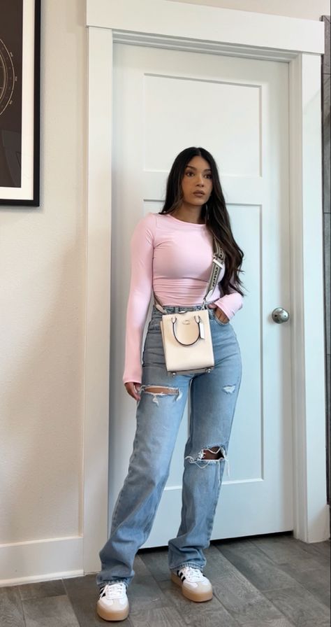 High waisted wide leg ripped jeans, long sleeve light pink t shirt, adidas sambaes, coach mini tote crosd body. #casualoutfit #fashion #petitefashion #outfitideas #whattowear #simpleoutfit #jeansoutfit #jeanootd #casualwear #valentinesdayoutfit Cute Casual Baddie Outfits, Long Sleeve With Jeans Outfits, Jeans Valentines Outfit, Baddie Long Sleeve Outfits, Outfit With Light Jeans, Outfit With Long Sleeve Shirt, Valentine Outfit Casual, Ny Casual Outfit, Pink Mom Outfit