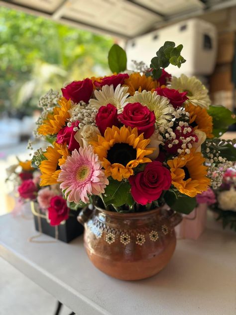 Mexican Inspired Flower Arrangements, Mexican Wedding Decor Ideas, Flower Bouquet Mexican, Charro Theme Centerpieces, Mexican Inspired Floral Arrangements, Hacienda Centerpieces, Mexican Bouquet Of Flowers, Mexican Centerpiece Ideas Quince, Barro Centerpiece