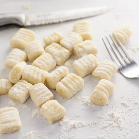 Homemade Potato Gnocchi Recipe - If you've ever wondered if you can make your own Homemade Potato Gnocchi, you can! With this easy, detailed recipe and tutorial, you'll be making your new favorite gnocchi like a pro in no time! Make your own homemade potato gnocchi to put in your favorite pasta recipe. Homemade Potato Gnocchi, Gnocchi Recipes Homemade, Chicken Gnocchi Soup Recipe, Cauliflower Gnocchi, Ricotta Gnocchi, Favorite Pasta Recipes, Homemade Flour Tortillas, Homemade Gnocchi, Potato Gnocchi