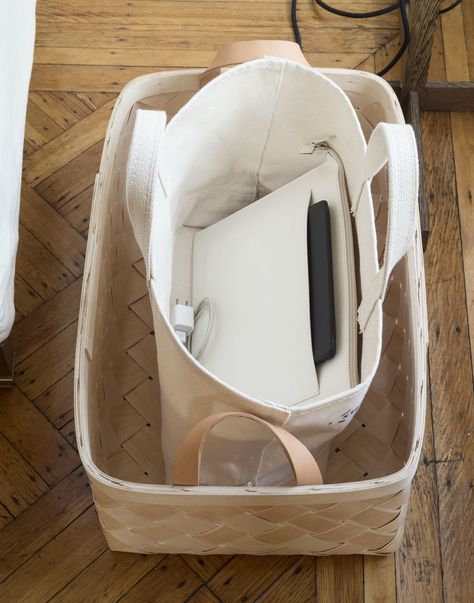 3 Ways to Create a Home Office Anywhere (And Put It Away at the End of the Day) - Remodelista Work Bag Storage At Home, Office On The Go Bag, Gift Bag And Tissue Paper Organization, Office In A Bag, Office-friendly Tan Tote Bag, On-the-go Laptop Bag With Removable Pouch, Office Nooks, Create A Home Office, Bags Inside