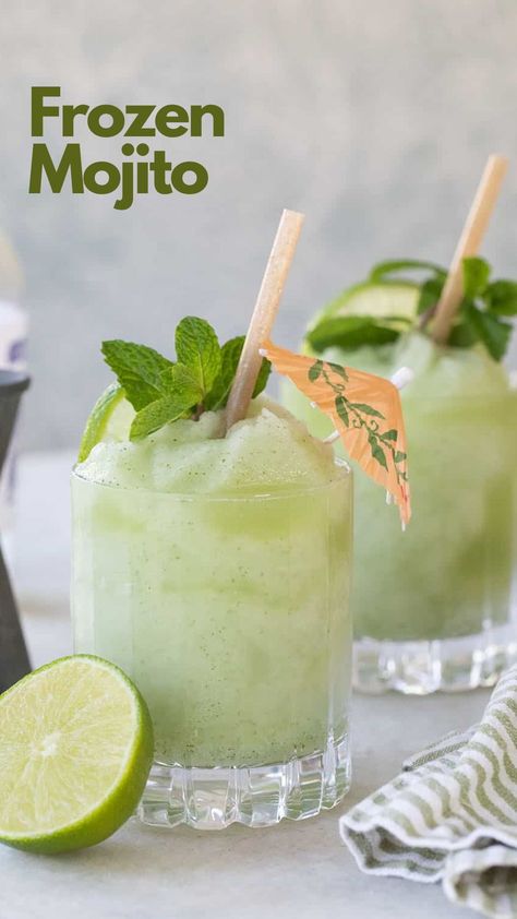 Elevate your classic Mojito by making these frozen mojitos this summer instead! Frozen mojitos have the same basic ingredients as the original drink: fresh mint, lime juice, light rum, and soda. This version uses limeade to keep the lime flavor strong even when blended with ice. #FrozenMojito Frozen Mojito Recipe, Frozen Mojito, Frozen Peach Bellini, Classic Mojito, Board Night, Frozen Drink Recipes, Drinks To Try, Mojito Mocktail, Virgin Mojito