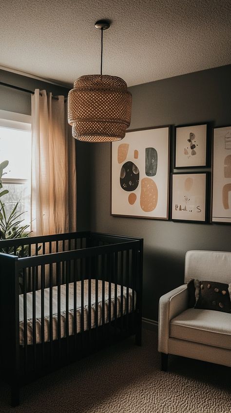 Modern gender-neutral nursery with a black crib, white armchair, abstract wall art, and natural light from large windows. Nursery Black Accents, Modern Boys Nursery, Nursery With Grey Crib, Wooden Crib Nursery, Modern Nursery Boy, Black Crib Nursery, Modern Baby Boy Nursery, Nautical Theme Nursery, Gender Neutral Nursery Design