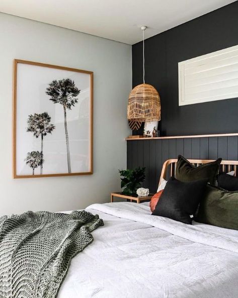 Taking things a little boho now, with this gorgeous bedroom featuring a black panel ledge wall. We’re not usually ones for feature walls, but here where the material has been switched up, it just works. The rattan pendant light and soft white bedding pairs perfectly with the palm print wall art. Click the image and come explore more black wall inspiration. Boho Master, Black And White Bedroom, Interior Design Institute, Feature Wall Bedroom, Design Institute, Dekorasi Kamar Tidur, North Coast, Small Room, Master Bedrooms Decor