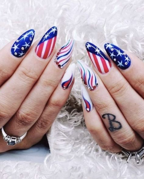 Show your patriotic spirit with chic Fourth of July nails featuring sleek and sophisticated designs. Picture nails adorned with subtle stars, stripes, and flag motifs, creating a timeless and elegant manicure that's perfect for celebrating Independence Day. 🇺🇸💅 #FourthOfJuly #PatrioticManicure #AmericanPride Stripe Nail Art Designs, Rockabilly Nails, 4th Nails, Striped Nail Designs, Patriotic Nail, Watching Fireworks, Patriotic Nails, American Nails, Usa Nails