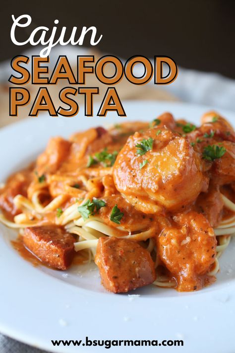 I had to bring back this Cajun Seafood Pasta Recipe because it is so-damn-good! This Cajun Seafood Pasta is full of spicy sausage, shrimp, and plump sea scallops while served over linguine in a spicy tomato cream sauce! Cajun Scallops Pasta, Andoullie Sausage, Spicy Tomato Cream Sauce, Cajun Seafood Pasta, Sausage Shrimp, Scallop Pasta, Tomato Cream Sauce, Chicory Recipe, Cajun Seafood