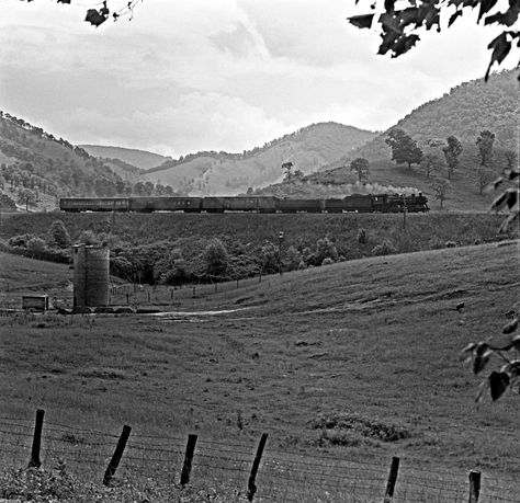 NW, Pounding Mill, Virginia, 1958 Norfolk and Western Railway Light Pacific leads Norton train through hilly terrain near Pounding Mill, Virginia, on May 10, 1958. Photograph by J. Parker Lamb, © 2015, Center for Railroad Photography and Art. Lamb-01-050-08 Railroad Workers Vintage, Steam Trains Photography, Metro North Railroad, Norfolk And Western Railroad, Steam Locomotive Photographs, Railroad Pictures, Train Photography, Railroad Photography, Garratt Locomotive