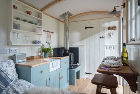 Shepherd's Hut Interiors: 21 Amazing Designs You've Got To See Shepherds Hut For Sale, Small Wood Burning Stove, Shepherds Huts, Shepherd Hut, Shepherd Huts, Fold Down Table, Outdoor Tables And Chairs, Shepherds Hut, Shed Homes