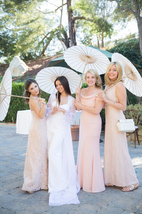 bridesmaids with parasols - photo by Melissa Gidney Photo http://ruffledblog.com/contemporary-montecito-wedding-at-home Parasol Wedding Bridesmaids, Wedding Parasols Bridesmaids, Bridesmaids With Parasols, Wedding Parasols Ceremony, Parasol Umbrella Wedding, Parasol Wedding Photos, Bridesmaid Parasol, Bridesmaids Parasols, Bridesmaids Umbrellas