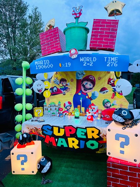 Mario Halloween Trunk Or Treat, Mario Truck Or Treat, Mario Kart Golf Cart Decor, Super Mario Golf Cart, Mario Parade Float Ideas, Trunk Or Treat Super Mario Theme, Super Mario Parade Float, Super Mario Bros Parade Float, Mario Golf Cart Decorations