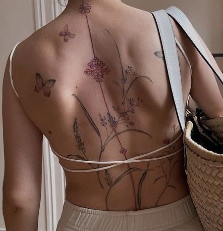 Artistic Back Tattoos, Delicate Floral Back Tattoo, Tattoos You Can Hide, Lavender Back Tattoo, Tattoo On Tan Skin, Floral Back Tattoos, Abstract Tattoo Designs, Tattoo Now, Cute Tiny Tattoos