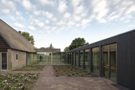 Zinc Roof, Exterior Color Palette, Wooden Columns, Youth Hostel, Temporary Structures, Facade Cladding, Van Damme, Thatched Roof, Rain Water Collection