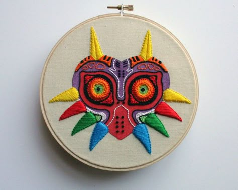 Legend Of Zelda Embroidery, Zelda Embroidery, Majoras Mask Art, Zelda Crafts, Mask Embroidery, Embroidered Wall Art, Embroidery Leaf, Embroidery Hoop Wall Art, Majoras Mask