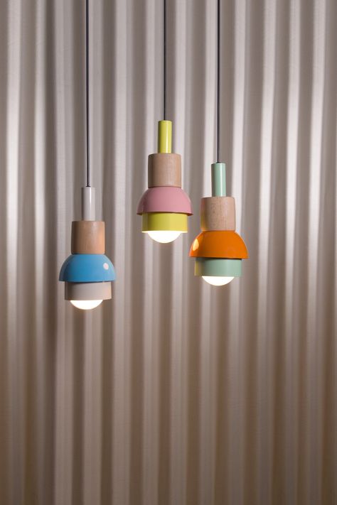 What sets our iconic style product apart is not only its vibrant colors and playful design, but also our commitment to sustainability. We proudly refrain from using plastic packaging, and ensure that 97% of our product is handmade with care. The remaining 3% is reserved for the electrical cables that make these lights shine. Transform your living space with our stunning pendant light chandelier. Handcrafted with precision and care, this elegant piece will illuminate any room with a warm and invi Colorfull Lamp, Colorful Pendant Light, Colorful Chandelier, Wood Light Fixture, Colorful Lamps, Lamp Ideas, Playful Decor, Handmade Lamps, Pendant Lights & Chandeliers