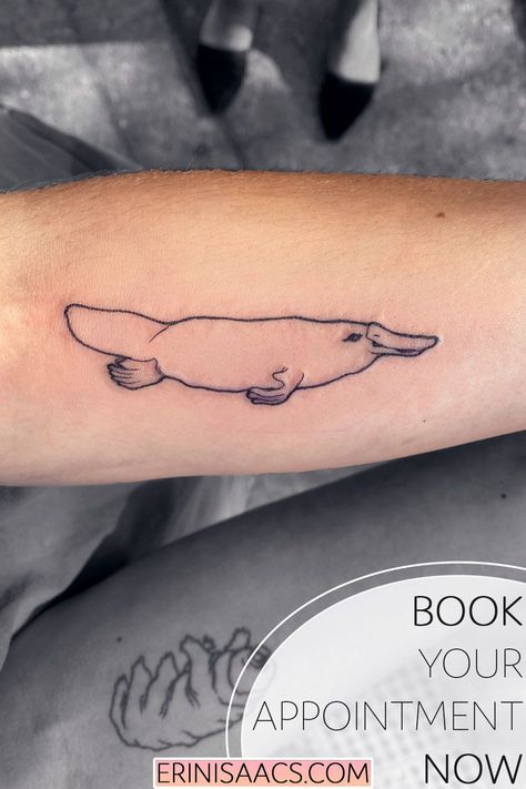 Looking for a small tattoo with a lot of meaning? This client got a platypus because they don't fit into any scientific classifications, and it reminds her that things don't always have to fit into a box. Book your next tattoo now! Animal | Line Work | Simple | Cute | Outside The Box | Ink via @erinisaacstattoos Small Funny Animal Tattoos, Salmon Tattoo Ideas, Small Salmon Tattoo, Small Ocean Animal Tattoo, Fine Line Ocean Animal Tattoos, Platypus Tattoo, Animal Pfp Funny, Animal Wallpaper Aesthetic, Character Pfp