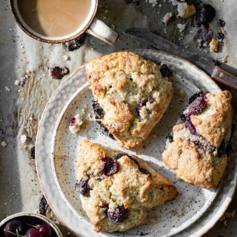 Homemade Cherry Scones Recipe is the perfect breakfast treat for cherry season. Large easy scones flavored with fresh cherries, orange, vanilla, and almond. #cherryscones #cherryrecipes #sconesrecipe #cherrysconesrecipe #twocupsflour Cherry Scones Recipe, Berry Scones, Cherry Scones, Blueberry Biscuits, How To Make Scones, Chocolate Blueberry, Inside Cake, Chocolate Scones, Scones Recipe