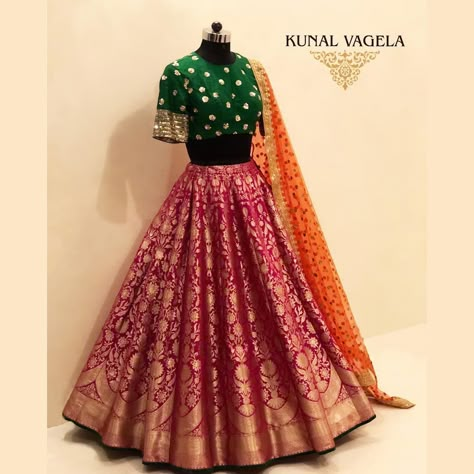 No photo description available. Banarasi Lehenga Ideas, Lehenga Designs Banarasi, Benarasi Lehengas Bridal, Red Benarasi Lehengas, Banarasi Chaniyacholi, Red Banarasi Lehenga, Banarasi Lehenga Bridal, Benarasi Lehengas, Banarasi Bridal Lehenga