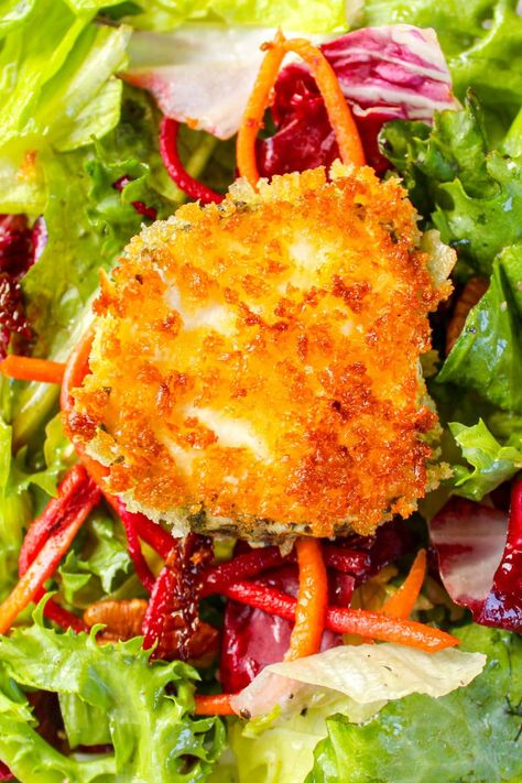 This simple goat cheese salad stars a round of goat cheese, breaded and fried to a golden brown, then nested on dressed greens. Pretty, creamy, tangy and crunchy. Vegetable Strudel, Mesclun Salad, Cheese Salad Recipes, Fried Goat Cheese, Goat Cheese Recipes, Simple Vinaigrette, Beetroot Salad, Salad Toppings, Goat Cheese Salad