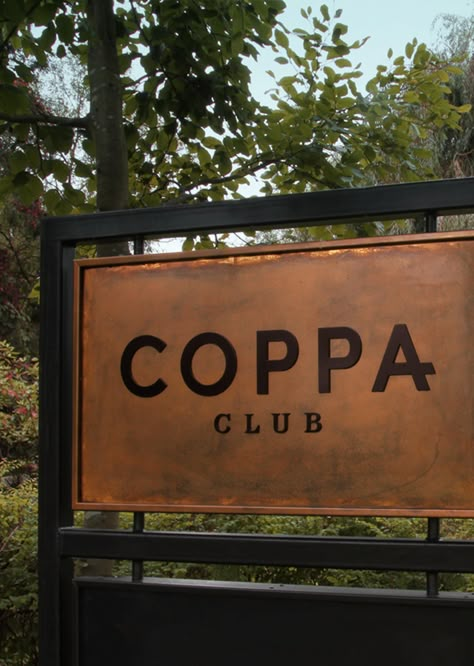 Coppa Club - The non-members, members club | The Plant Business Sign Ideas Outdoor, Apartment Signage Exterior, Wooden Signage Design Outdoor, Copper Signage, Business Signs Outdoor Signage, Sign Design Outdoor, Winery Entrance, Neighborhood Signage, Farm Signs Entrance