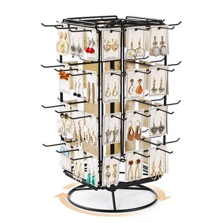 This metal earring rack holder stand features a 360 rotating design that allows you to showcase your earrings, necklaces, and keychains from all angles, making it a stunning focal point in your store or boutique. With 4 tiers and 48 hooks, this display stand efficiently organizes your jewelry collection while saving space on your display counter. The versatile display options provided by the rotating stand ensure that your customers can easily browse through various types of earrings and necklac Earring Display Diy, Rotating Jewelry Display, Earring Rack, Countertop Table, Vanity Space, Store Shelves Design, Shelves Design, Keychain Display, Table Vanity