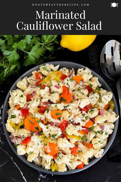 This marinated cauliflower salad recipe is crunchy, tangy, and full of fresh flavor. Perfect for picnics, potlucks, and BBQs. Marinated Salad Recipes, Marinated Cauliflower, Raw Cauliflower Salad, Raw Salad Recipes, Cauliflower Salad Recipe, Picnic Side Dishes, Southern Greens, Raw Cauliflower, Cauliflower Salad