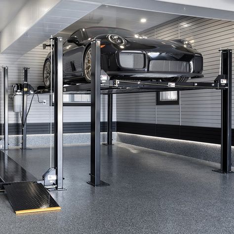 Garages With Car Lifts, Garage Lift Ideas, Garage With Car Lift, Garage With Lift, Car Lifts For Garage, Luxury Garage Design, Car Lift Garage, Garage Laundry Area, Garage Doors Ideas