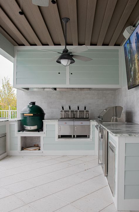 Redesign your outdoor cooking space - a functional design so you can get the most out of your summer kitchen. #biggreenegg #builtingrill #bbqarea #outdoorkitchen #outdoorlivingspace Outdoor Kitchen Hardie Board, Modern Coastal Outdoor Kitchen, Shiplap Outdoor Kitchen, Outdoor Kitchen Wall Ideas, Hardie Board Outdoor Kitchen, Southern Outdoor Kitchen, Coastal Outdoor Kitchen, Florida Outdoor Kitchen, Outdoor Kitchen Wall