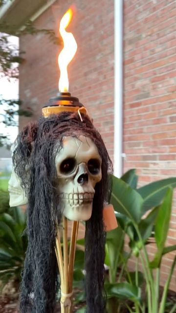 Halloween Tiki Torches, Skull Tiki Torch Diy, The Navage Patch Halloween, Haunted Bayou, Halloween Shrunken Heads, Drinking Pirate Skeleton Diy, Haunted Luau, Summerween Party, Halloween Chandelier