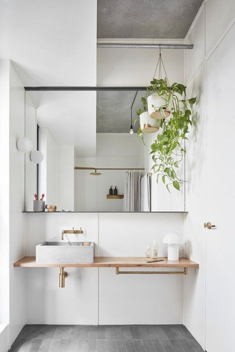 To inspire your next remodel with their minimal palettes, clean lines, and modern designs, here are 10 Scandinavian bathroom ideas that prove sometimes less really is more. #hunkerhome #scandistyle #scandinavianbathroom #bathroom #minimalist Bohemian Bathroom, Bathroom Storage Solutions, Australian Interior Design, Scandinavian Bathroom, Interior Design Awards, Interior Plants, Boho Bathroom, Bathroom Countertops, Interior Design Magazine