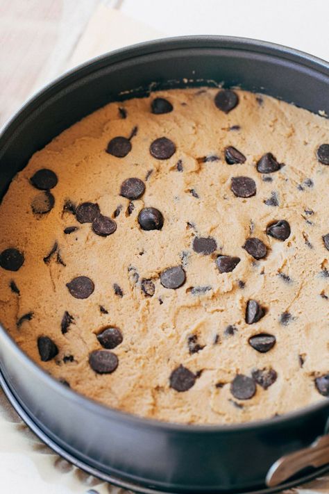 This is the ultimate chocolate chip cookie cake recipe! It makes one giant soft, rich, and dense cookie cake that's perfect for any celebration. Top with your favorite icing and sprinkles and dig in! #cookiecake #chocolatechipcookiecake #chocolatechipcookie #butternutbakery | butternutbakeryblog.com Mrs Fields Cookie Cake, Chocolate Chip Cookie Cake Recipe, Best Chocolate Chip Muffins, Giant Cookie Cake, Butternut Bakery, Ultimate Chocolate Chip Cookie, Giant Chocolate Chip Cookie, Chocolate Chip Cookie Cake, Cookie Cakes