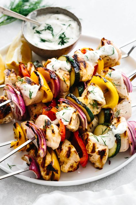 These Greek chicken kabobs soaked in the best chicken marinade are a summer grilling staple! They're juicy, flavorful, and best served with my homemade tzatziki sauce. Kabob Dipping Sauce, Downshiftology Chicken, Mediterannean Diet, Downshiftology Recipes, Souvlaki Chicken, January Reset, Greek Chicken Kabobs, Greek Dinner, Greek Diet