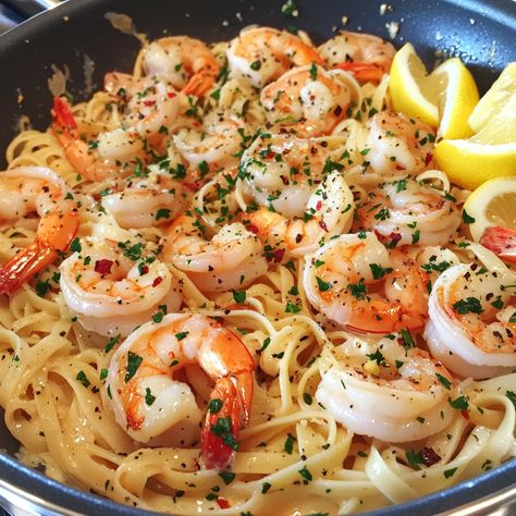 🍤🍝 Craving a flavorful, easy dinner? Try this Garlicky Shrimp Scampi with Linguine—it's packed with flavor! 😋✨ #ShrimpScampi #PastaLove Garlicky Shrimp Scampi with Linguine Ingredients: Linguine (12 oz) Shrimp, peeled and deveined (1 lb) Unsalted butter (1/4 cup) Olive oil (2 tbsp) Garlic, minced (4 cloves) Red pepper flakes (1/2 tsp) White wine (1/2 cup) Lemon juice (2 tbsp) Fresh parsley, chopped (1/4 cup) Salt and pepper (to taste) Lemon wedges (for serving) Instructions: Cook linguine... Garlicky Shrimp, Instagram Recipes, Shrimp Scampi, Trending Recipes, Lemon Wedge, Linguine, Red Pepper Flakes, Fresh Parsley, Red Pepper