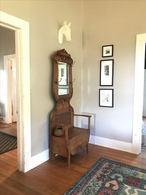 Foyer With Hall Tree, Antique Hall Tree Decorating Ideas, Hall Tree Antique, Antique Hall Tree Entryway, Foyer Styling, 100 Year Old Farmhouse, Dark Maximalism, Antique Hall Tree, Hall Trees