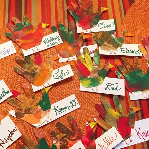 Child art hand print turkey place cards Diy Thanksgiving Place Cards Kids, Kid Made Thanksgiving Place Cards, Thanksgiving Table Name Cards Kids Diy, Thanksgiving Placecards Ideas For Kids, Kids Thanksgiving Place Cards, Thanksgiving Placecard Ideas, Diy Thanksgiving Place Cards, Thanksgiving Place Cards Diy Kids, Thanksgiving Name Place Cards Diy Kids