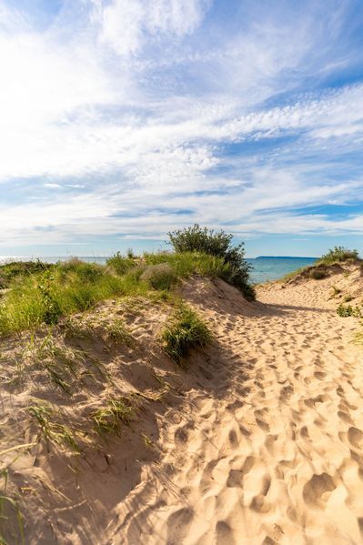 Hiking Sand Dunes at Sleeping Bear Dunes National Lakeshore - Annie Fairfax Sleeping Bear Dunes Michigan Photography, Beaches In Michigan, Sand Dunes Michigan, Landform Projects, Sleeping Bear Sand Dunes, Wake Boarding, Beach Dunes, Chicago Trip, Safe House