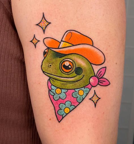 30 Fabulous Frog Tattoo Ideas for Men & Women in 2023 Frog Tattoos Traditional, Clown Frog Tattoo, Color Tattoos Men, Cute Frog Tattoo Ideas, Funny American Traditional Tattoo, Frog Traditonal Tattoo, Old School Frog Tattoo, Traditional Tattoo Women, American Traditional Frog Tattoo