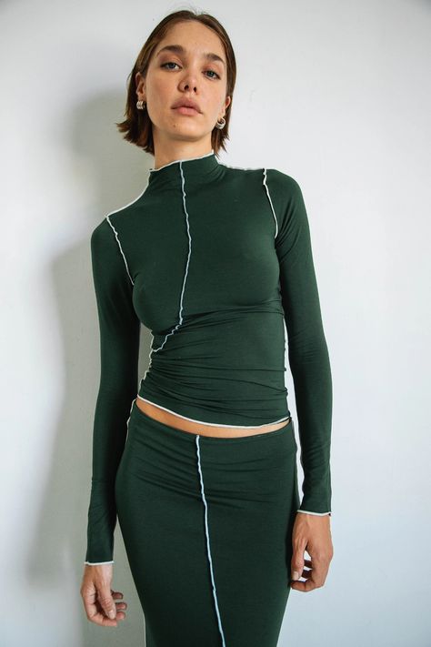 ZANE TOP HUNTER GREEN – The Line by K Basic Tee Outfit, Dark Green Skirt, Tee Outfits, Long Sleeve Turtleneck Dress, Casual Turtleneck, Pleated Skirt Short, Crop Top Skirt Set, Plaid Pullover, Green Suit