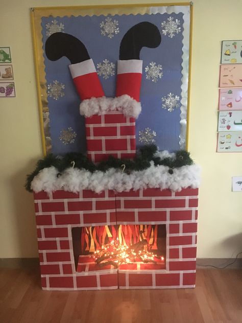 Fireplace Board Preschool, Christmas Fireplace Bulletin Board, Fireplace Classroom Decoration, Fireplace Christmas Door Decorations, Chimney Bulletin Board Ideas, Classroom Fireplace Diy, Fireplace Preschool Classroom, Diy Fireplace For Classroom, Fireplace Classroom Door Decoration