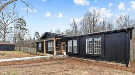 Painting Manufactured Home Exterior, Black Double Wide Exterior, Black Single Wide Trailer, Making A Manufactured Home Look Like A House, Modular Home Siding Ideas, Mobile Home Upgrades Exterior, Cute Manufactured Homes, Black Exterior Mobile Home, Black Double Wide Mobile Home Exterior