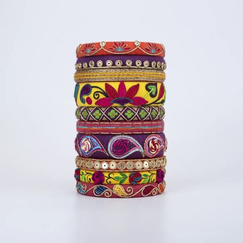 The Heritage range is more than just a collection of bangles—it's a tribute to the integral history of art and its evolution over time, leaving an indelible imprint on future generations. Each bangle in this collection is a homage to our roots, reminding us of the rich cultural tapestry that defines us, no matter where we are in the world. Crafted by skilled artisans, these handmade bangles embody the essence of our heritage, personifying what is embodied in our DNA. With intricate designs an... Ancient Indian Art, History Of Art, Thread Bangles, Handmade Bangles, Andhra Pradesh, Bangle Set, Intricate Designs, Indian Art, Natural Dyes