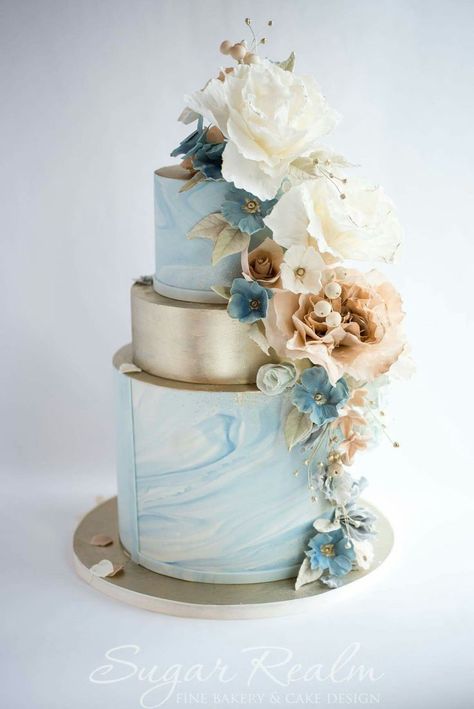 We don’t like the marble or fondant, but like the idea of a champagne gold tier. Cake With Flowers, Fondant Wedding Cakes, Romantic Wedding Cake, Winter Cake, Marble Wedding, Tiered Cake, Chocolate Wedding Cake, Wedding Cakes Blue, Amazing Wedding Cakes