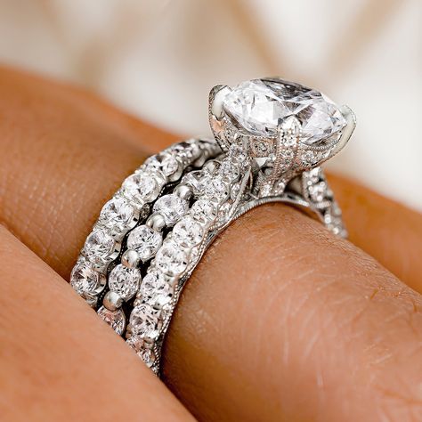 The diamond intense look of this platinum HT2663RD8 engagement ring from Tacori’s RoyalT collection is accentuated by a matching HT254525B34 Petite Crescent wedding band featuring a beautiful string of round cut diamonds. Stacked here with The Tacori 266625B34 Sculpted Crescent band featuring .53 carats of diamonds wrapping three-quarters the way around the finger. See these rings and more from Tacori in our Strongsville showroom. Tacori Engagement Rings Round, Tacori Wedding Rings, Tacori Wedding Band, Beautiful Wedding Ring Sets, Dog Fever, Tacori Rings, Stacked Engagement Ring, Modern Wedding Rings, Tacori Engagement Rings