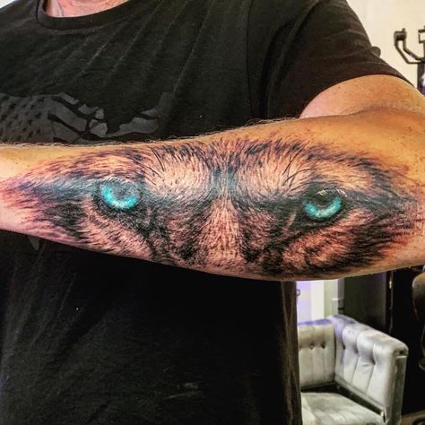 Wolf eyes tattoo Wolf Eyes Forearm Tattoo, Wolf Eye Tattoo Forearm, Wolf Eyes Tattoo, Wolf Forearm Tattoo, Wolf Eye Tattoo, Wolf Face Paint, Wolf Face Tattoo, Wolf With Red Eyes, Wolf And Moon Tattoo