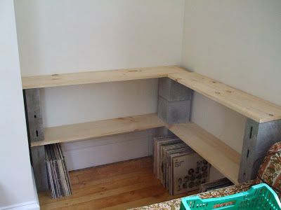 DIY custom record shelves: Never underestimate the efficacy of good ol' cinder blocks and pine boards - especially if you've got a small odd-shaped area to work with. This unused corner area was converted to a record station for a mere $30. Cinder Block Shelf, Record Station, Block Shelves, Cinder Block Shelves, Record Shelves, Wood Bench Design, Custom Record, Cinder Block Furniture, Custom Shelf