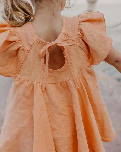 🍑 PEACH LINEN the sweetest set of Flutter Sleeve Tie Back Blouse with “Bouquet 2” embroidery and Bermuda Shorts in Peach linen 🍑 beautiful photos by @juliadukephoto Kids Linen Clothes, Baby Fashion Newborn, Tie Back Blouse, Summer Embroidery, Baby Dress Design, Baby Dress Patterns, Girl Inspiration, Girls Dresses Summer, Fashion Kids