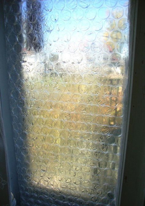 Misted Bubble Wrap Applied to Window: Mist is the magic that helps panels stick to panes. Bubble Wrap Window Insulation, Winter Hacks Cold Weather, Bubble Wrap Windows, Winter Preparation, Camper Windows, Window Wrap, Diy House Renovations, Winter Window, Winter Hacks